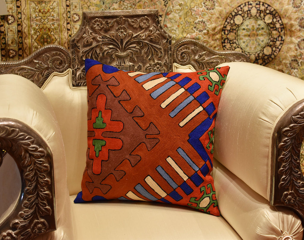 https://kashmirdesigns.com/cdn/shop/products/Kilim-Pillow-Cover-Tribal_Dragon_Aztec_Southwestern-handembroidered-square-ethnic-throw-pillows-cushion-cover-sofa-couch-wool-1A_1024x1024.JPG?v=1579511147