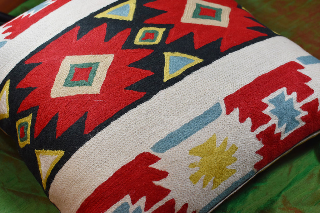 https://kashmirdesigns.com/cdn/shop/products/Tribal_Butterfly_Aztec_Southwestern-pillow-cover-handembroidered-square-modern-throw-pillows-cushion-cover-sofa-couch-contemporary-wool-02_1024x1024.jpg?v=1607018426
